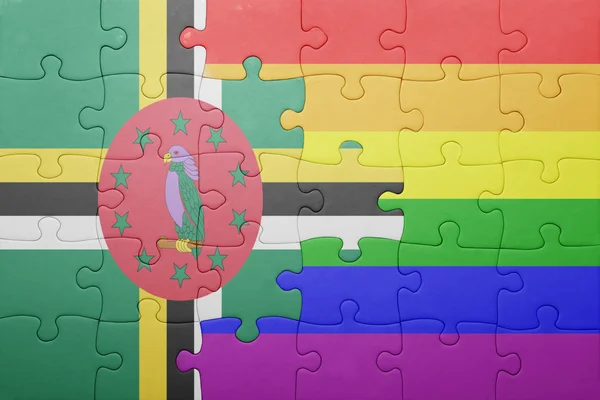 Puzzle avec le drapeau national de la Dominique et le drapeau gay — Photo