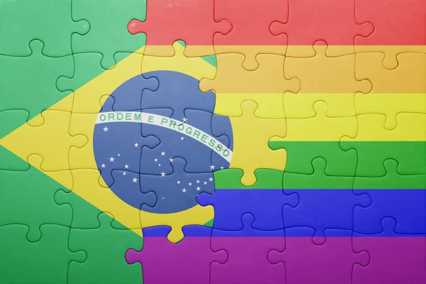 Quebra-cabeça com a bandeira nacional do brasil e bandeira gay — Fotografia de Stock