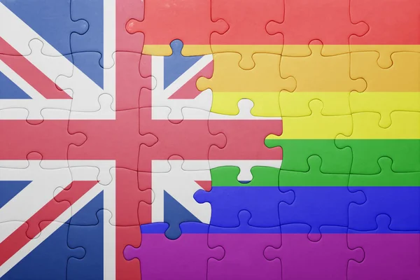 Puzzle with the national flag of great britain and gay flag — Stock Photo, Image
