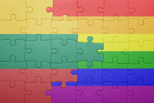 Puzzle with the national flag of lithuania and gay flag — Stock Photo, Image