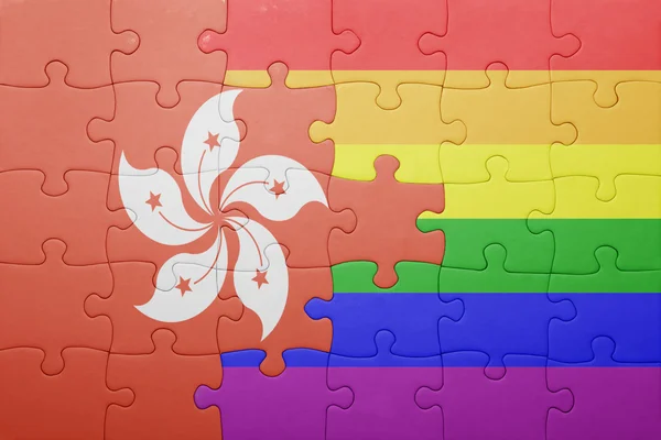 Pussel med den nationella flaggan av hong kong och gay flagga — Stockfoto