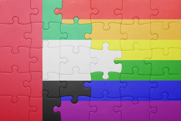 Puzzle mit der Nationalflagge der Vereinigten Arabischen Emirate und der Homosexuellen-Flagge — Stockfoto