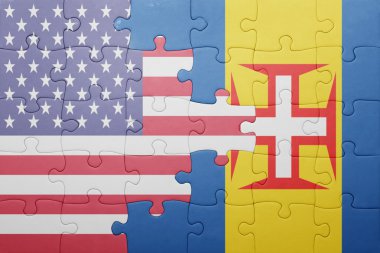 puzzle with the national flag of united states of america and madeira 