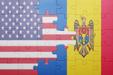 puzzle with the national flag of united states of america and moldova 