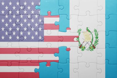 puzzle with the national flag of united states of america and guatemala 