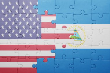 puzzle with the national flag of united states of america and  nicaragua