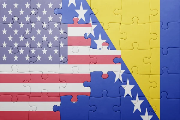 Puzzle with the national flag of united states of america and bosnia — Stok fotoğraf