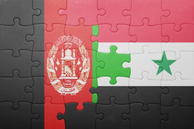 puzzle with the national flag of syria and afghanistan