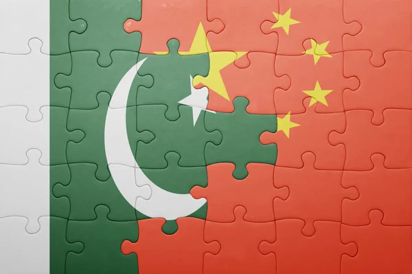 Puzzle with the national flag of china and pakistan — Stock Photo, Image