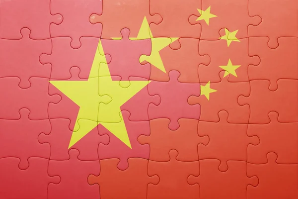 Puzzle s národní vlajkou Číny a Vietnamu — Stock fotografie