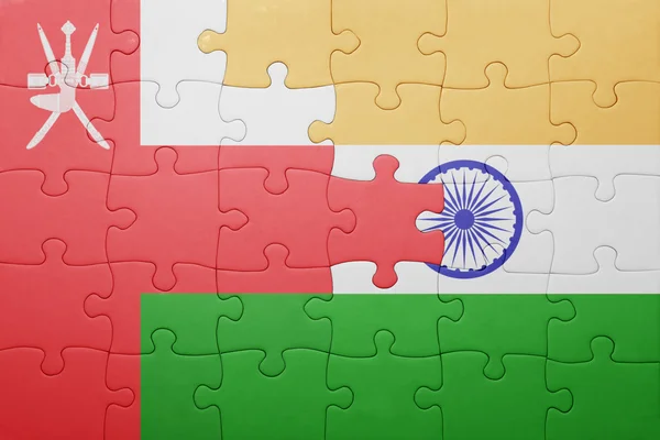 Puzzle con la bandiera nazionale dell'India e oman — Foto Stock