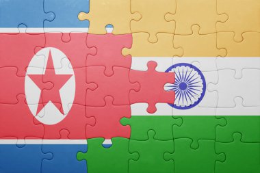 puzzle with the national flag of india and north korea 
