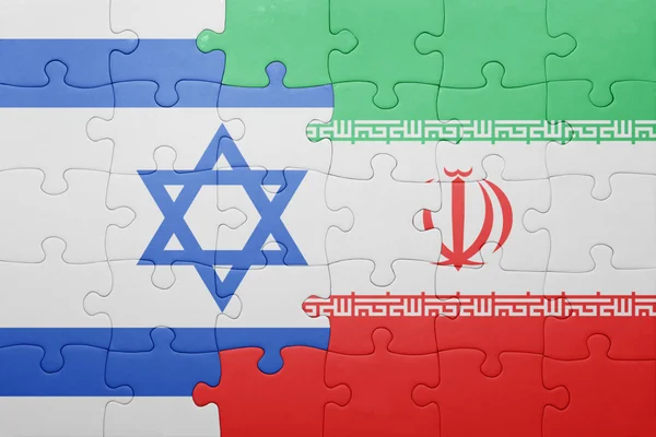 Puzzle avec le drapeau national de l'iran et d'Israël — Photo