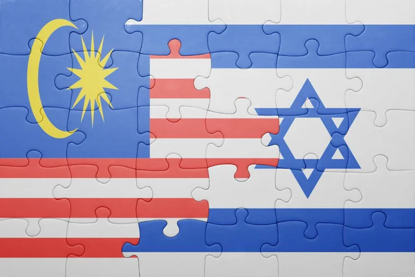 Puzzle with the national flag of israel and malaysia — Stock Photo, Image