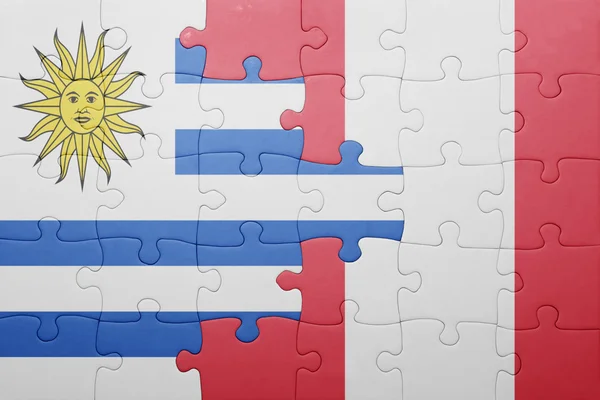 Puzzle with the national flag of peru and uruguay — Stock Photo, Image