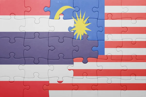 Puzzle with the national flag of malaysia and thailand — Stock Photo, Image