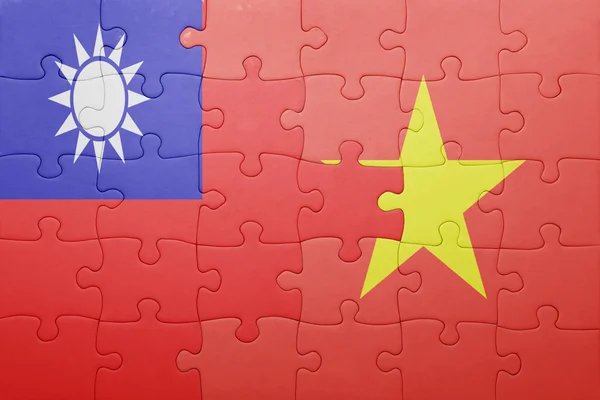 Puzzle with the national flag of vietnam and taiwan — Stock Photo, Image