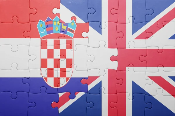 Puzzle avec le drapeau national de la Grande Bretagne et de la croatie — Photo