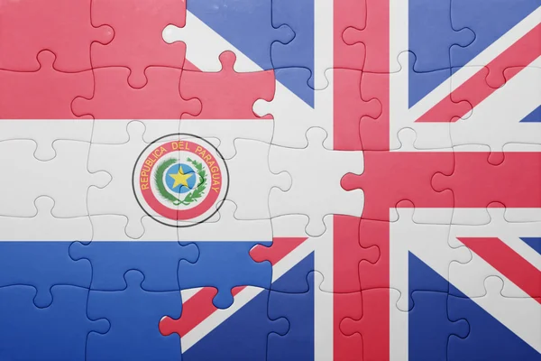 Puzzle s národní vlajka Velké Británie a paraguay — Stock fotografie