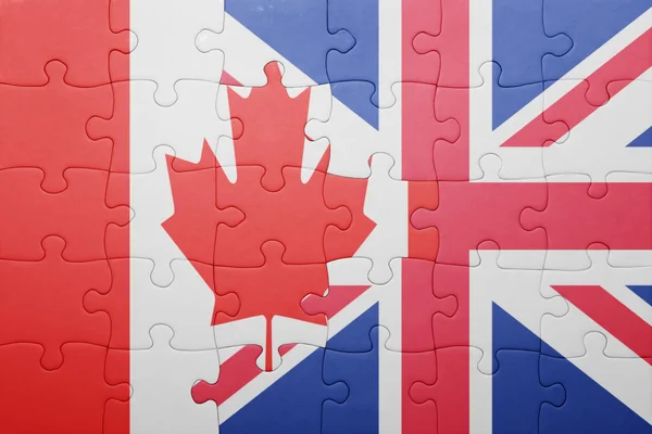 Puzzle z Wielkiej Brytanii i Kanadzie Flaga narodowa — Zdjęcie stockowe