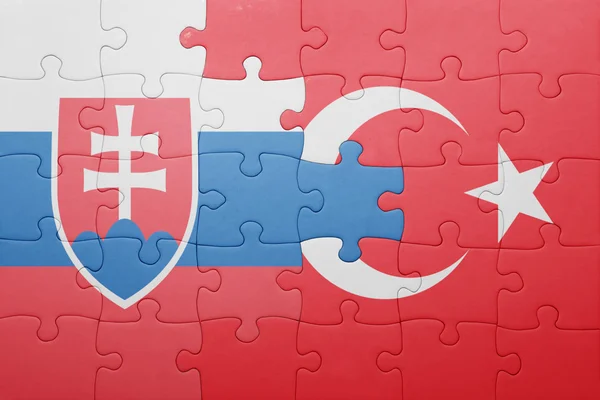 Puzzle s národní vlajkou Turecka a Slovenska — Stock fotografie
