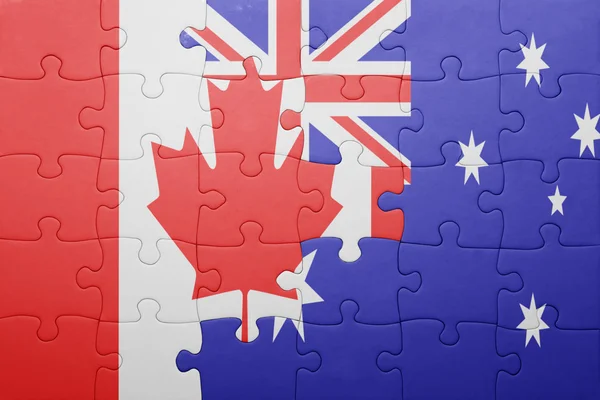 Puzzle z flagi narodowej Kanady i Australii — Zdjęcie stockowe