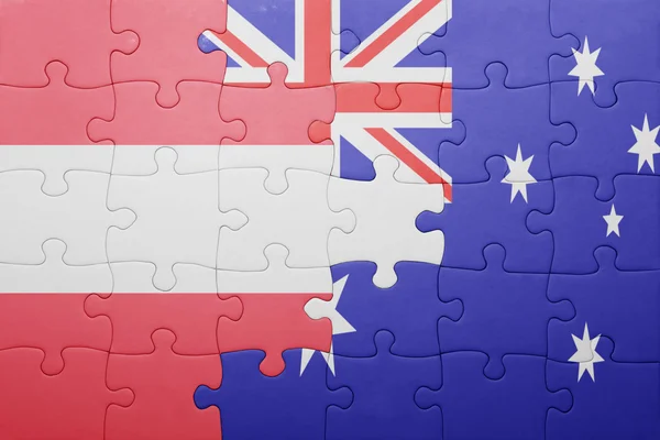 Puzzle avec le drapeau national de l'Autriche et de l'Australie — Photo