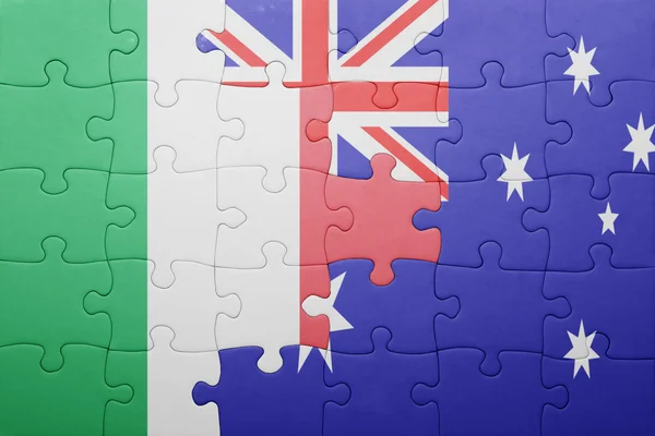 Puzzle mit der Nationalflagge Italiens und Australiens — Stockfoto