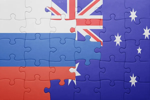 Puzzle con la bandiera nazionale e australia — Foto Stock