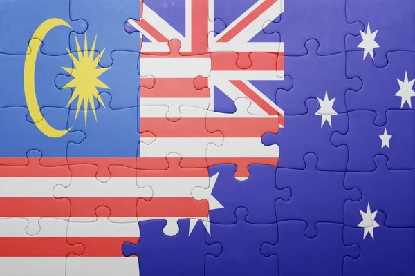 Puzzle with the national flag of malaysia and australia — Stock Photo, Image