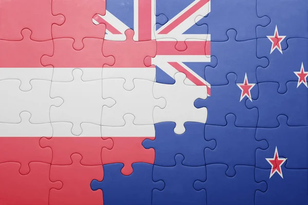 Puzzle avec le drapeau national de l'Autriche et de la Nouvelle-Zélande — Photo