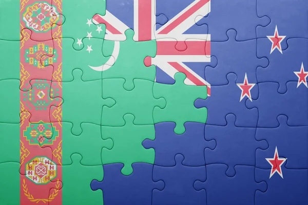 Puzzle with the national flag of turkmenistan and new zealand — Stock Photo, Image