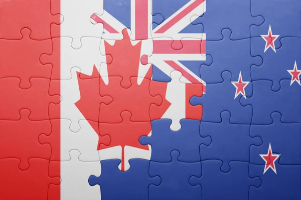 Puzzle avec le drapeau national du Canada et de la Nouvelle-Zélande — Photo
