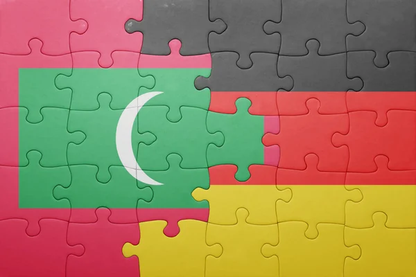 Puzzle with the national flag of germany and maldives — Stock Photo, Image