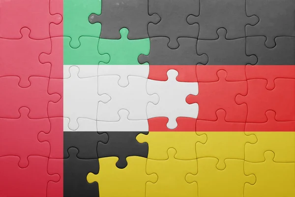 Puzzle z flagi narodowej Niemcy i Zjednoczone Emiraty Arabskie — Zdjęcie stockowe