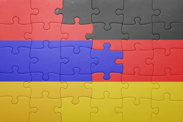 Puzzel met de nationale vlag van Armenië en Duitsland — Stockfoto