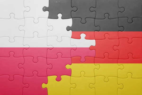 Puzzel met de nationale vlag van Polen en Duitsland — Stockfoto