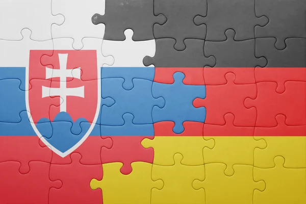 Puzzle con la bandiera nazionale della Slovacchia e Germania — Foto Stock