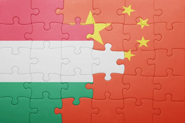 ハンガリー、中国の国旗をパズルします。 — ストック写真