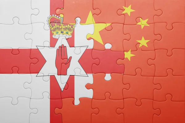 Puzzle with the national flag of northern ireland and china — Stock Photo, Image