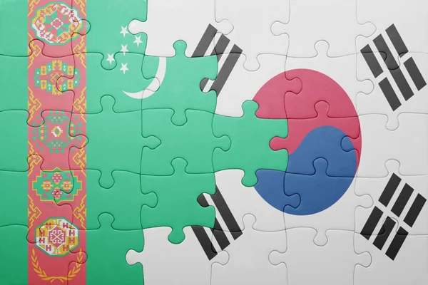 Puzzle avec le drapeau national du turkmène et de la Corée du Sud — Photo