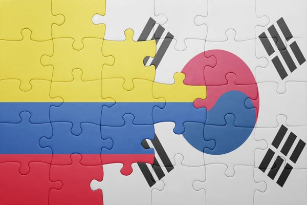 Puzzle mit der Nationalflagge Kolumbiens und Südkoreas — Stockfoto