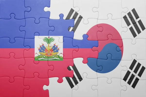 Rompecabezas con la bandera nacional de Haití y Corea del Sur — Foto de Stock