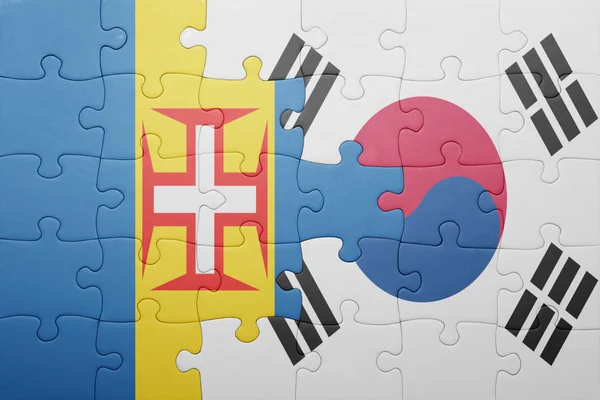 Rompecabezas con la bandera nacional de Madeira y Corea del Sur — Foto de Stock