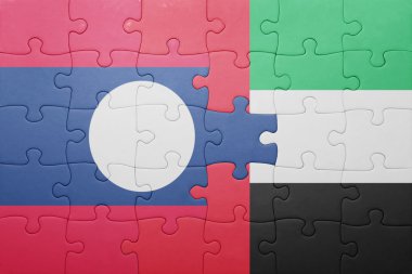 puzzle with the national flag of united arab emirates and laos