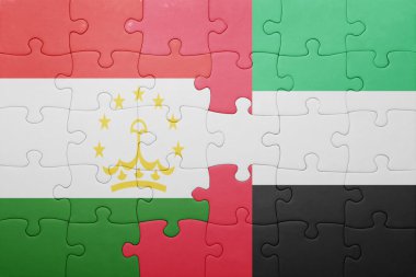 puzzle with the national flag of united arab emirates and tajikistan