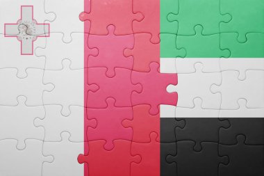 puzzle with the national flag of united arab emirates and malta