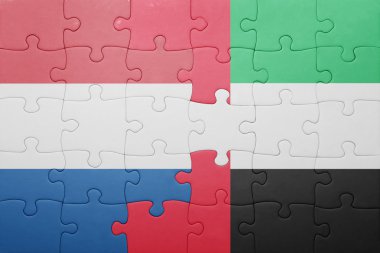 puzzle with the national flag of united arab emirates and netherlands