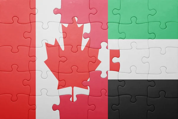 Puzzle with the national flag of united arab emirates and canada — Stock Photo, Image
