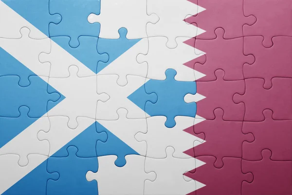 Puzzel met de nationale vlag van Schotland en qatar — Stockfoto